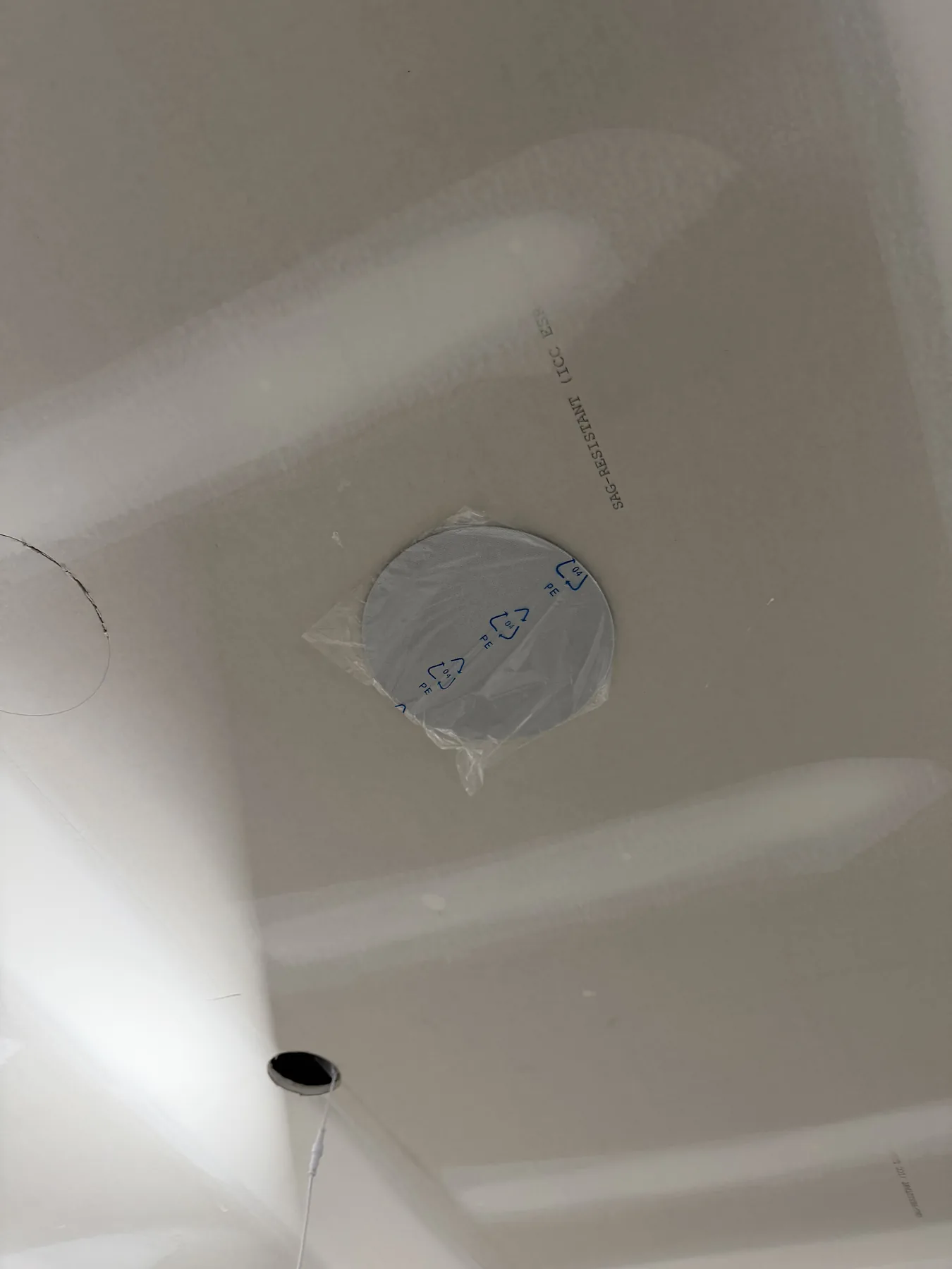 Recessed ceiling speaker cutout during AV installation