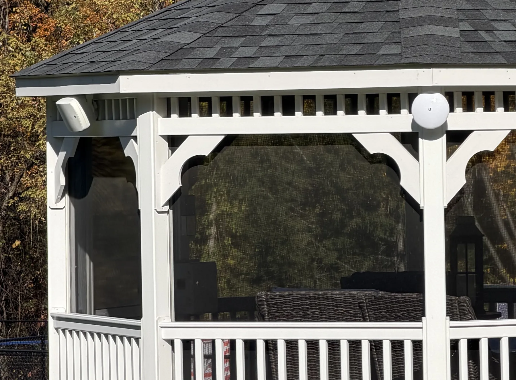 Outdoor speaker and Wi-Fi access point mounted on a gazebo