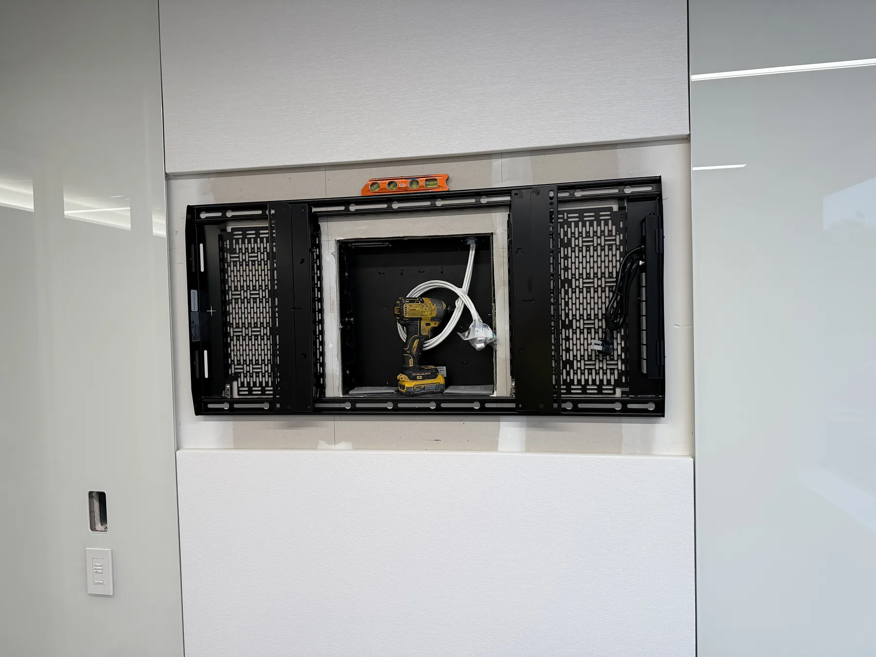 Dual-arm TV wall mount bracket with recessed power and data