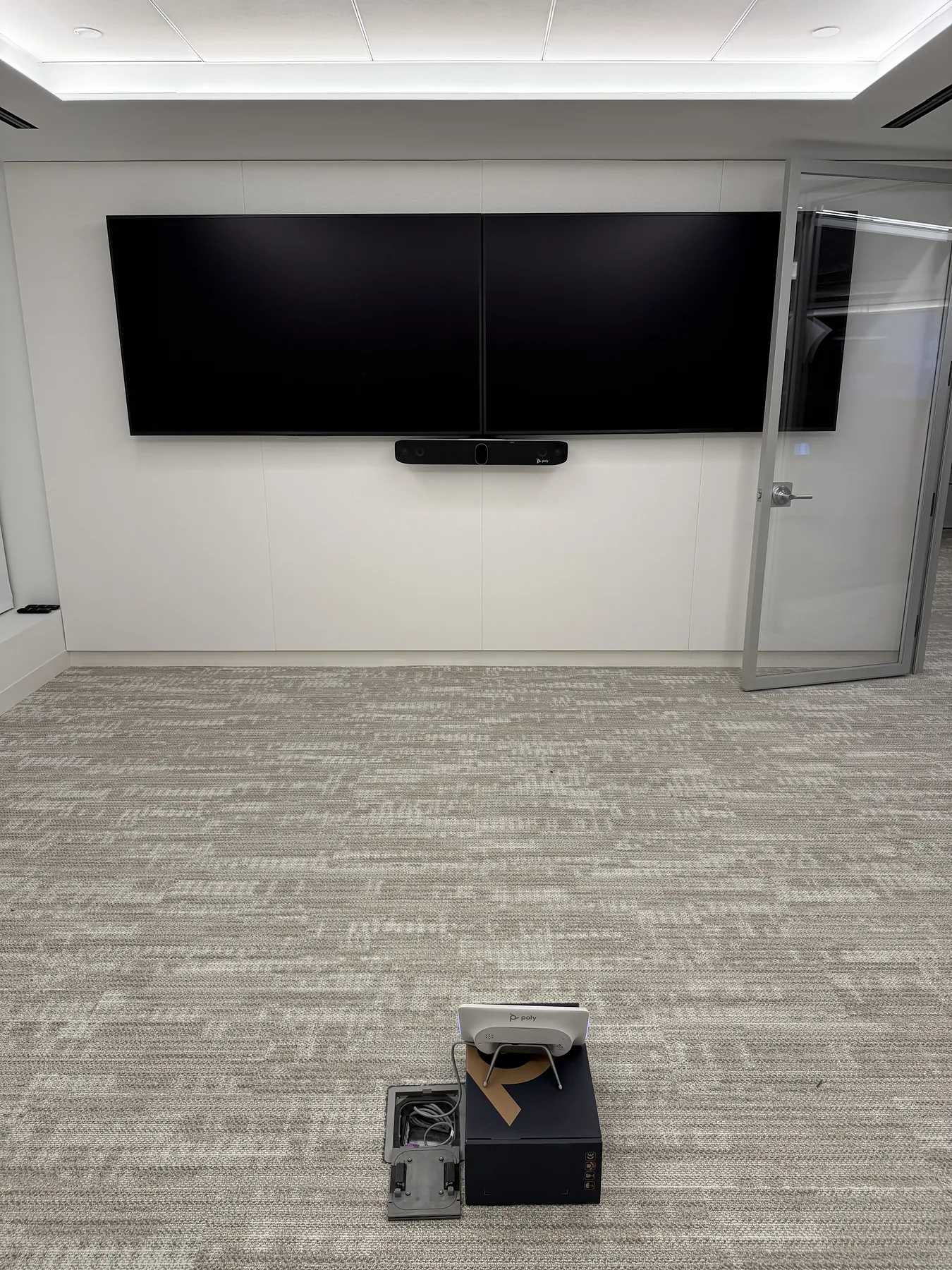 Finished conference room dual-display and soundbar setup