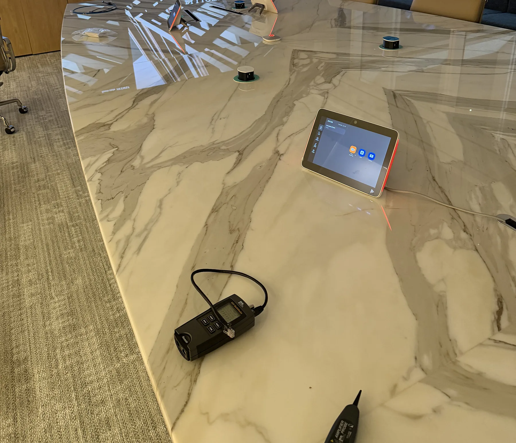 Conference table with integrated touch controller and microphones