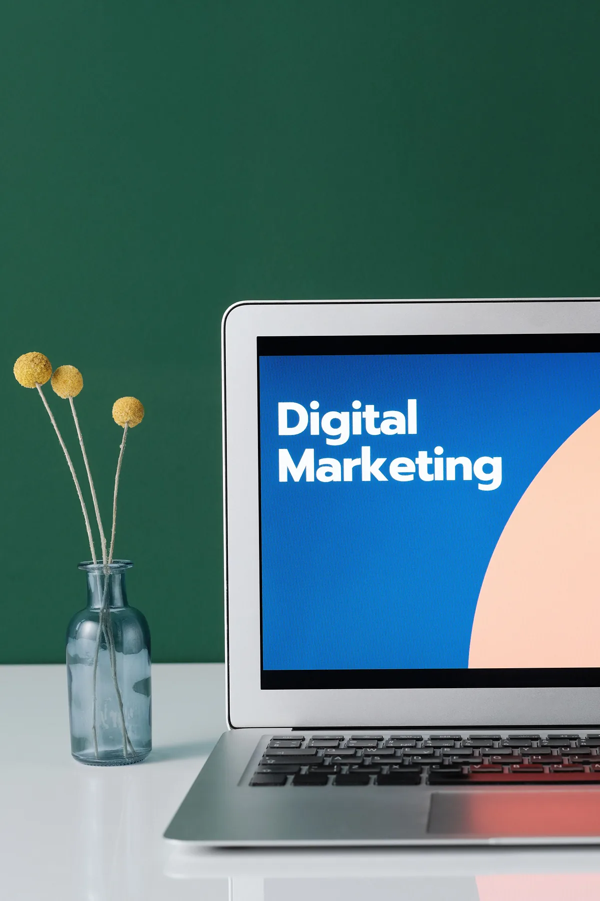 Laptop screen showing a digital marketing graphic