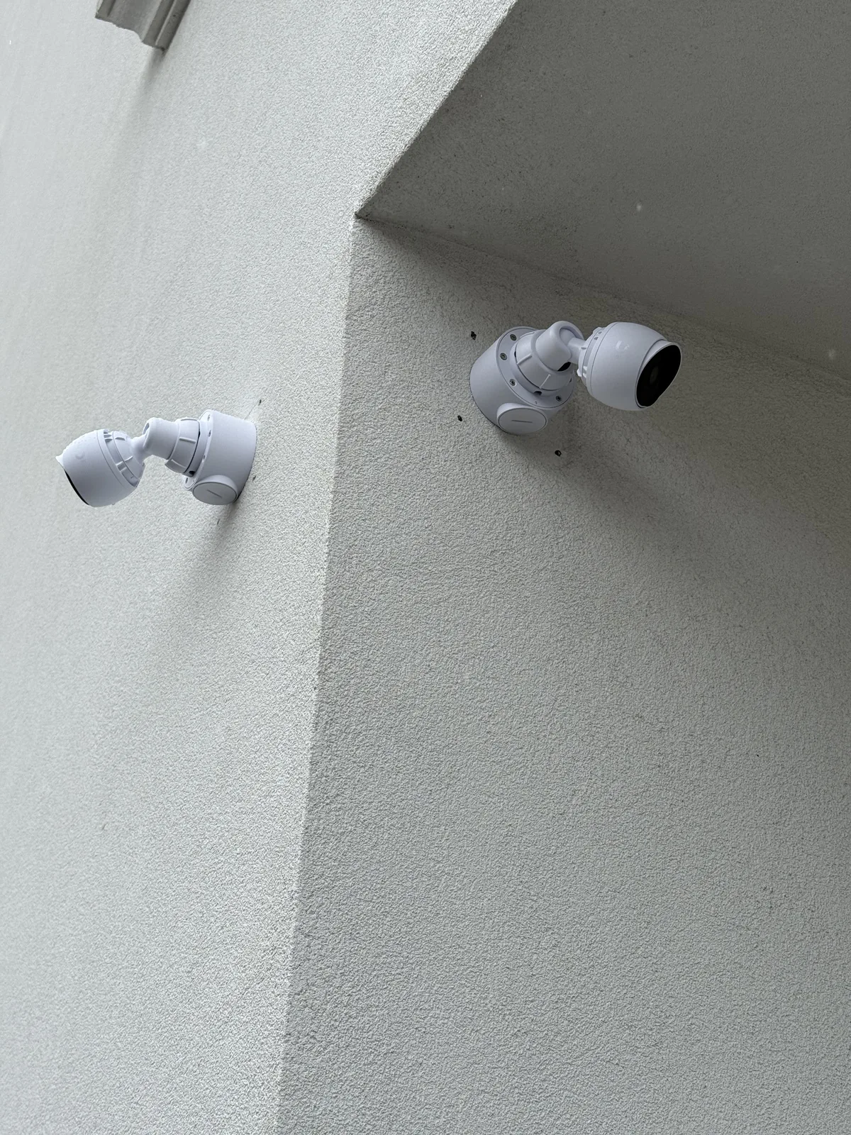 White exterior security cameras