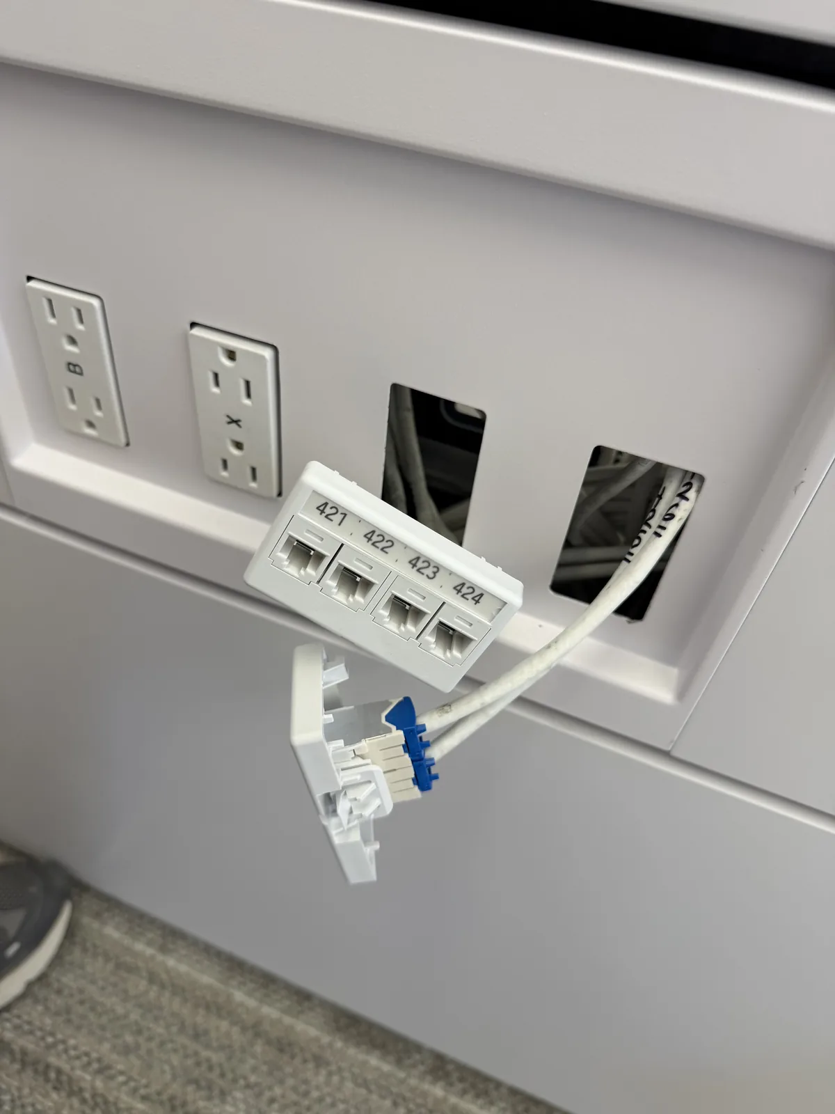 Terminated data jacks at a workstation